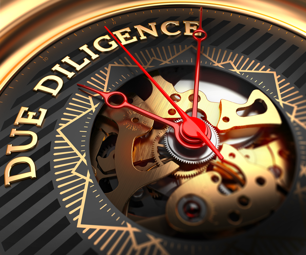 Due,Diligence,On,Black-golden,Watch,Face,With,Closeup,View,Of
